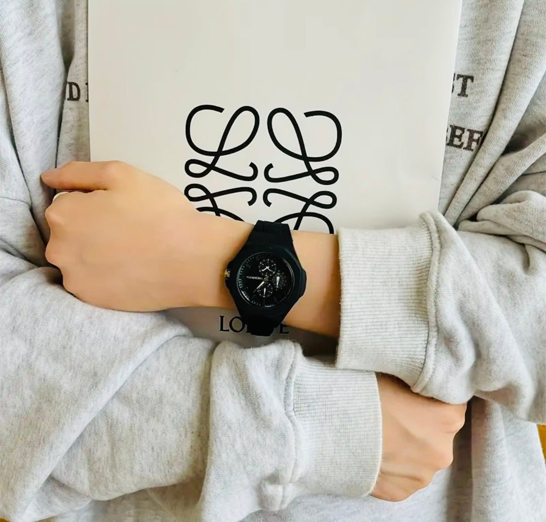 1 pza. Reloj casual para hombre REBIRTH con correa de silicón, carátula redonda, no resistente al agua, pantalla analógica, caja de plástico, movimiento de cuarzo, accionamiento electrónico - Regalo de Navidad